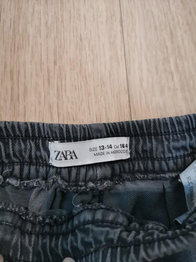 Grey Cargo Pants (Category: Babies & Kids Fashion) located in Singapore. Submitted by jw1084 (Listing ID 1377203823, Image 3). Description: 13-14 years old Item is in mint condition , no stains or rips in fabric..
