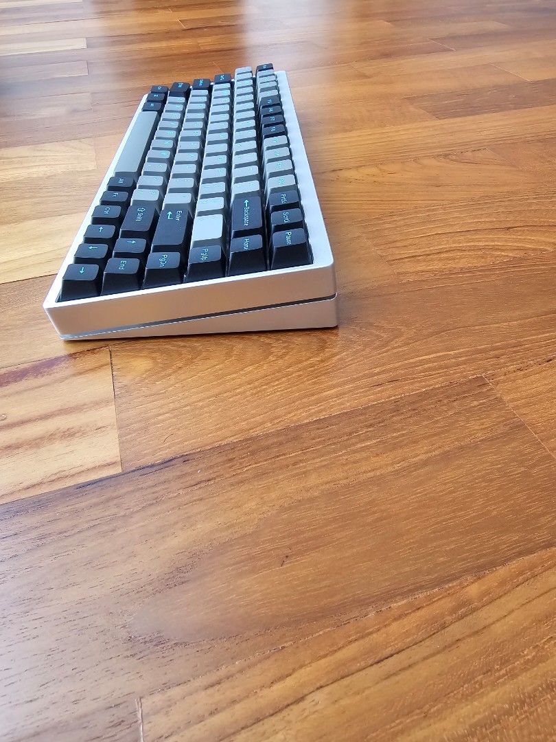 Kbdv2 75% steel mechanical keyboard (Category: Computer Keyboard) located in Singapore. Submitted by kcyq10 (Listing ID 1377235715, Image 2). Description: - 75% mechanical keyboard - silver case - Grey and black double shot ppt keycaps - Excellent condition - original box and accessories.