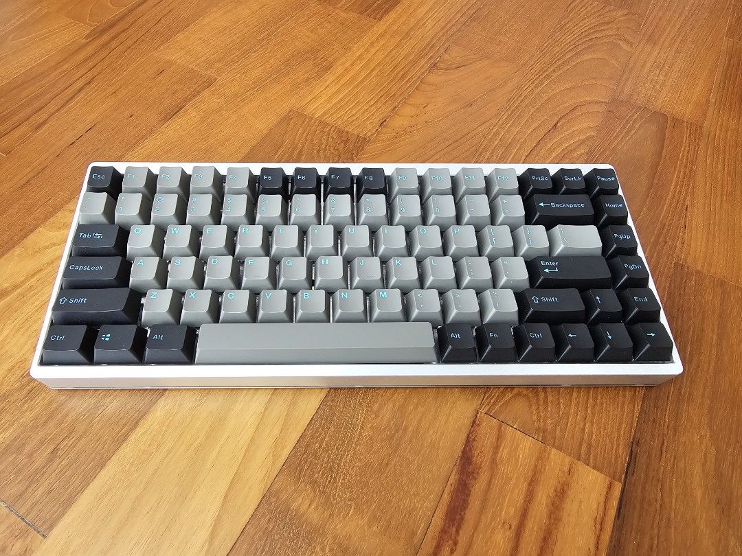 Kbdv2 75% steel mechanical keyboard (Category: Computer Keyboard) located in Singapore. Submitted by kcyq10 (Listing ID 1377235715, Image 1). Description: - 75% mechanical keyboard - silver case - Grey and black double shot ppt keycaps - Excellent condition - original box and accessories.