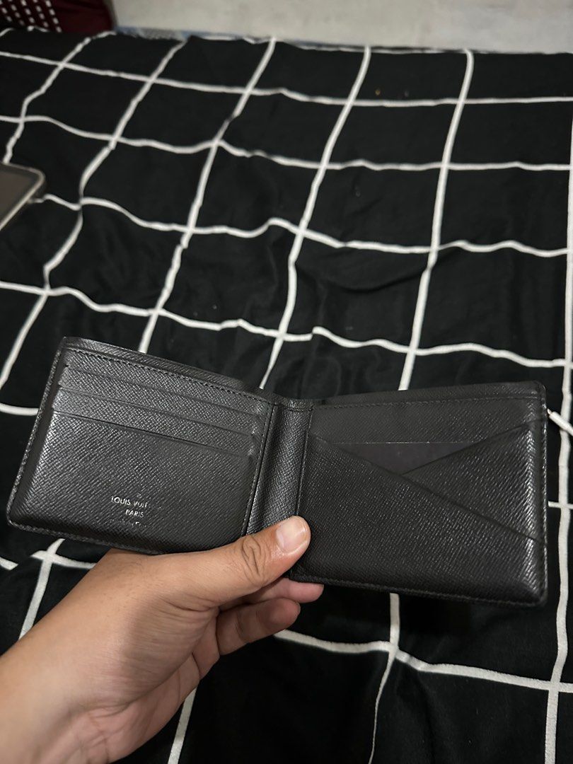 Louis Vuitton Graphite bifold wallet (Category: Luxury Bags & Wallets) located in Quezon City. Submitted by travisdiemon (Listing ID 1377345242, Image 2). Description: Authentic Condition 8.5/10 Sign of usage Very presentable.