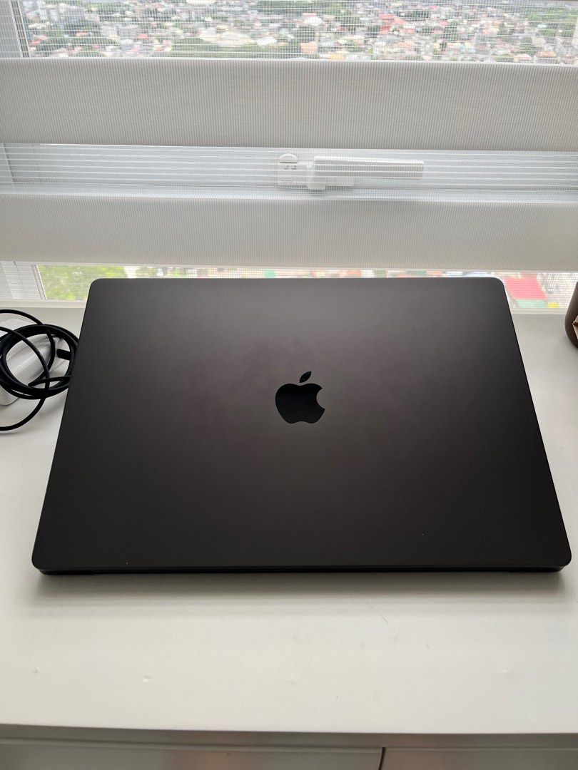 Macbook Pro M3 Pro 16 Inch 18 GB 512 (Category: Laptops & Notebooks) located in Quezon City. Submitted by frankiesbrah (Listing ID 1377226861, Image 3). Description: Price bought is 167,990. WITH BOX AND PAPER BAG (no receipt, lost) - 18 GB Memory - Perfect software condition - Minor dents and slight scratch on apple logo (not obvious, need to look closely to notice) - Comes with charger RFS - upgrade to M4 pro.