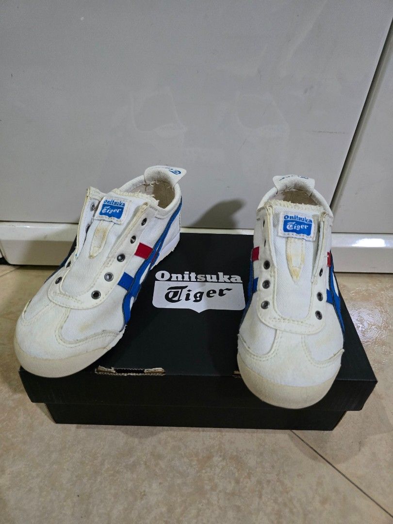 Onitsuka Tiger Slip On for Kids / Kids Sneakers - Size 18.5cm/ Eur30 (Category: Babies & Kids Fashion) located in Singapore. Submitted by bb.lbc (Listing ID 1377157544, Image 2). Description: A pair of lightly used kids' sneakers. Brand: Onitsuka Tiger. Made in Indonesia. Size: 18.5cm/ Euro30/ US K12. It comes with an original box. Note: Already washed, it's ready to wear. Self collect at Woodlands Drive 16 or meet at "Woodlands South" MRT..