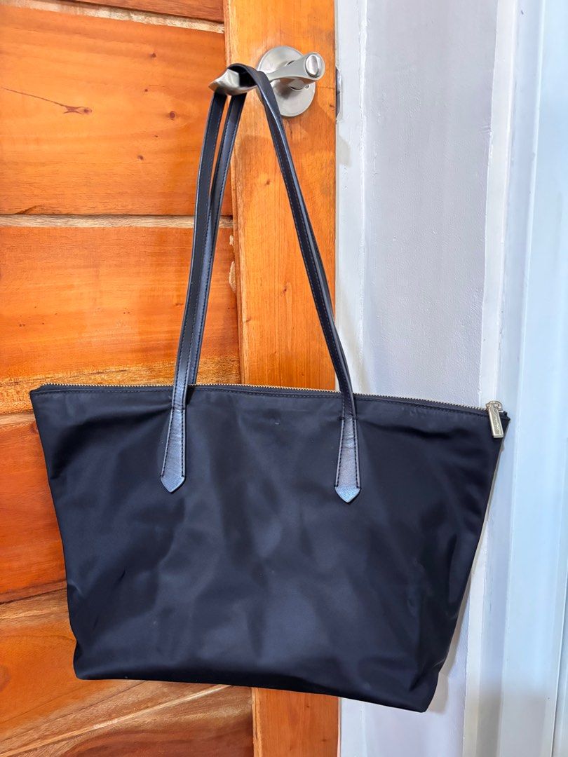 Original Kate Spade Large Tote Nylon Bag (Category: Tote Bags) located in Manila. Submitted by jinieb (Listing ID 1377270396, Image 3). Description: Size: 11”h x 12”w (bottom) 17.6”w (top) x 4.8”d handle drop: 11”.