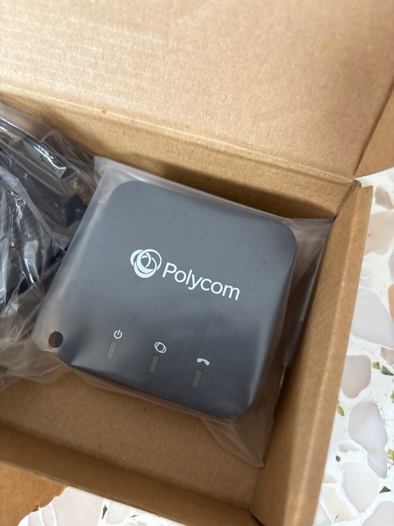 Polycom Bluetooth Adapter (Category: Other Accessories) located in Singapore. Submitted by ukyda (Listing ID 1377207969, Image 2). Description: Hey there! Selling this brand new Polycom Bluetooth Adapter. It's still in its original packaging, so you know it's never been used. The box is a little damaged, but the adapter itself is in perfect condition. It comes with all the original accessories, including the power adapter and any manuals. Perfect