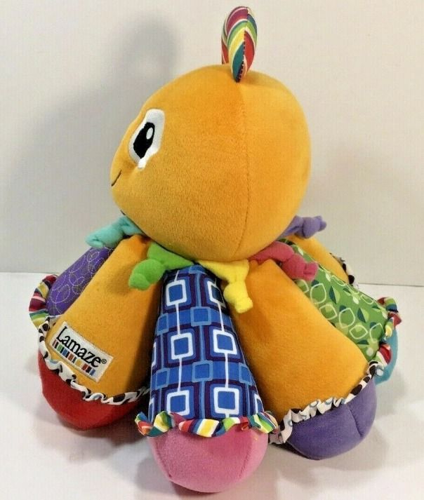 Preloved Lamaze Octotunes (Musical Octupos) (Category: Infant Playtime) located in Bangued. Submitted by lenc79928 (Listing ID 1376864792, Image 3). Description: Orange velour soft texture 13in tall octopus. MUSICAL OCTOPUS- Make merry music together with this classic toy designed for helping babies big or small learn through playing with color and sound SEE, TOUCH AND LEARN- Bright patterns and a big friendly smile help your little one's visual 