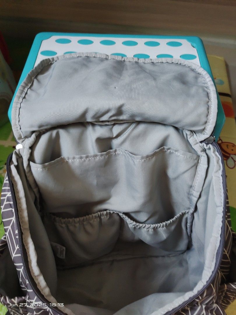 Skip Hop Diaper Backpack - Grey Chevron (Category: Diaper Bags & Wetbags) located in Singapore. Submitted by Boss_Baby (Listing ID 1377297835, Image 3). Description: - Skip Hop diaper backpack - Grey chevron pattern - Multiple compartments for organization - Adjustable straps for comfort - Good condition.