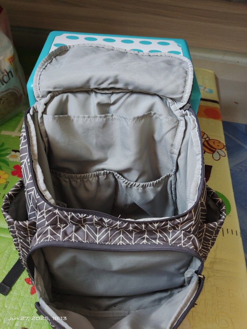 Skip Hop Diaper Backpack - Grey Chevron (Category: Diaper Bags & Wetbags) located in Singapore. Submitted by Boss_Baby (Listing ID 1377297835, Image 2). Description: - Skip Hop diaper backpack - Grey chevron pattern - Multiple compartments for organization - Adjustable straps for comfort - Good condition.