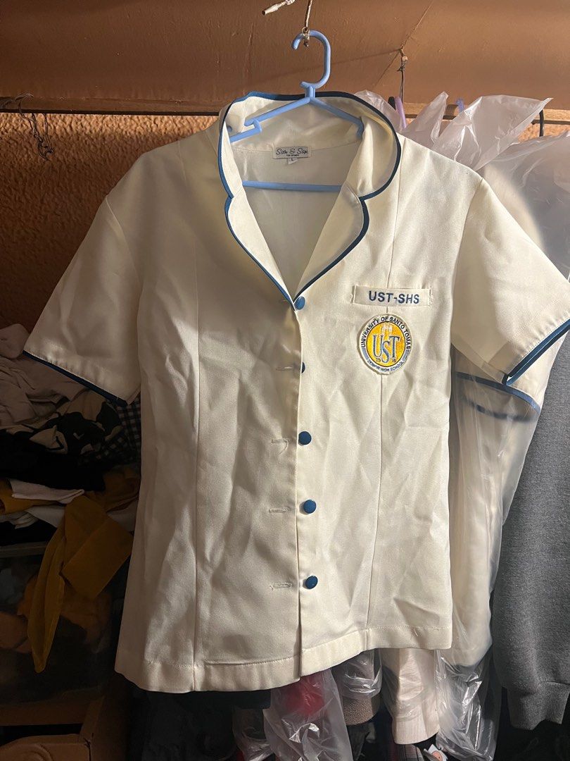 UST SHS WOMEN'S UNIFORM (LARGE) (Category: Blouses) located in Manila. Submitted by gaby_gambe (Listing ID 1377340210, Image 1). Description: see pics for minor flaws, originally bought for ₱450 but i need cash rn ₱150 if you buy it on the spot, pay first then i'll ship it to you, if not price is firm..