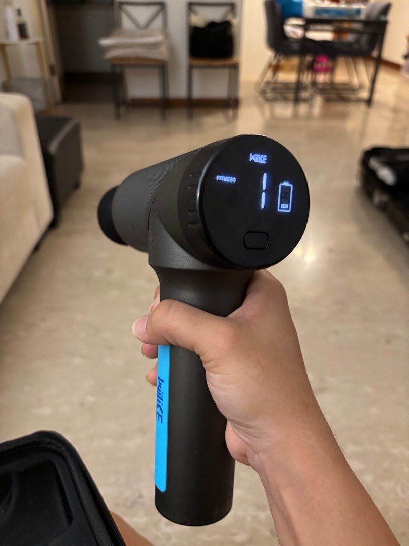 Willike Massage Gun - Like New (Category: Massage Devices) located in Singapore. Submitted by katty2202 (Listing ID 1377343075, Image 2). Description: Willike massage gun in excellent condition. Comes with all original attachments and charger, neatly stored in a carrying case. The device shows a battery level of 1 bar. Perfect for muscle recovery and relaxation..