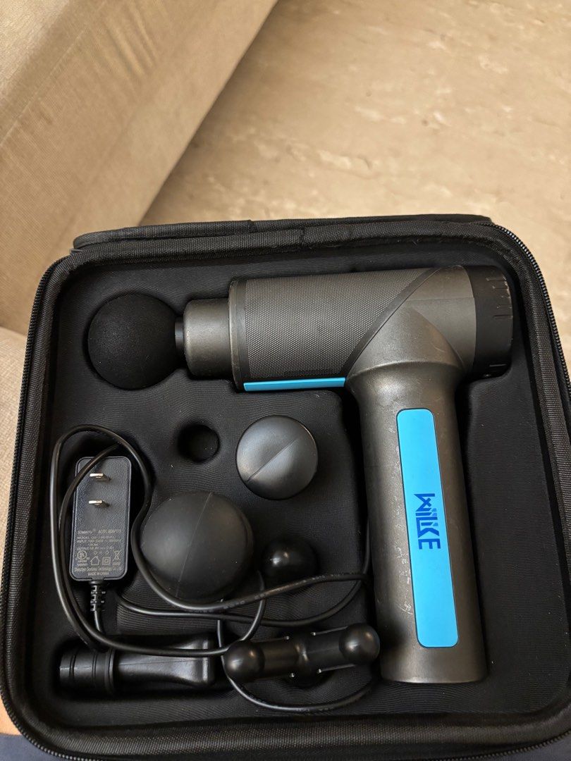 Willike Massage Gun - Like New (Category: Massage Devices) located in Singapore. Submitted by katty2202 (Listing ID 1377343075, Image 1). Description: Willike massage gun in excellent condition. Comes with all original attachments and charger, neatly stored in a carrying case. The device shows a battery level of 1 bar. Perfect for muscle recovery and relaxation..
