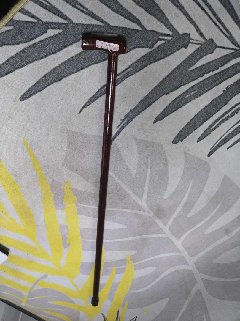 Wooden T Handle Walking Stick (Category: Other Assistive Aids) located in Santa Cruz. Submitted by jmy_surplus.2 (Listing ID 1377290729, Image 2). Description: Size ; L - 84 W - 9 Color ; Brown Type ; Walking Stick Brand ; No brand Material ; Wood Style ; Wooden Walking Stick MK A JMY 2.