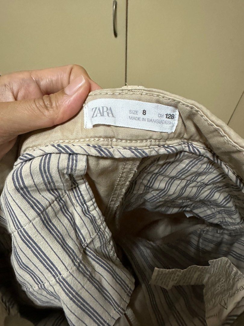 Zara Khaki Pants for Boys (Category: Babies & Kids Fashion) located in Binan City. Submitted by kayeym (Listing ID 1377372013, Image 3). Description: Barely used, 9.5/10 condition No flaws, no stains With waist adjustable Size 8yrs old DIMENSION: Waist - 12.5 inches Length - 30 inches.