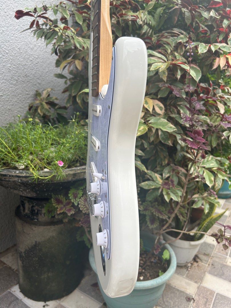 2023 Squier Affinity FSR Stratocaster (Category: Musical Instruments) located in Manila. Submitted by 5635ian81997 (Listing ID 1367060957, Image 3). Description: SQUIER FSR(Fender Special Run) All original. No issue. Tremolo arm included. Will come with extra set of strings, soft bag, strap and instrument cable. Poplar body, maple neck, Indian laurel fretboard, 2 point tremolo bridge, block saddle, pearloid pickguard. Light weight..