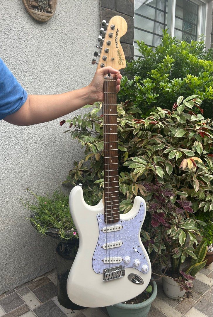 2023 Squier Affinity FSR Stratocaster (Category: Musical Instruments) located in Manila. Submitted by 5635ian81997 (Listing ID 1367060957, Image 2). Description: SQUIER FSR(Fender Special Run) All original. No issue. Tremolo arm included. Will come with extra set of strings, soft bag, strap and instrument cable. Poplar body, maple neck, Indian laurel fretboard, 2 point tremolo bridge, block saddle, pearloid pickguard. Light weight..
