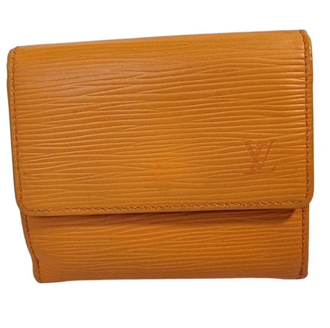 Authentic LOUIS VUITTON trifold (Category: Luxury Bags & Wallets) located in Quezon City. Submitted by maneradesignersboutique (Listing ID 1377430901, Image 1). Description: Money back guarantee 💯% Guaranteed authentic *Brand:* L.V. Double Sided Wallet *Materials*: Epi Leather *Color* : light Orange *Size*: Small *Condition*: 8.5/10 - USED *Inclusions: Wallet & box Rank review by the criterion of our shop about the products condition and level. 