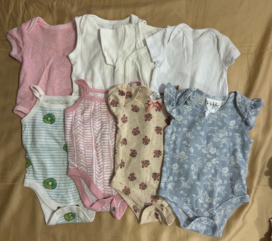 Baby Onesies - Various Brands - Size 0-3Months (Category: Babies & Kids Fashion) located in Singapore. Submitted by amazinglyuseful.things (Listing ID 1377474588, Image 2). Description: Boys Set - $5 Girls Set - $5 Bundle of baby onesies in various colors and patterns. Includes short-sleeved and long-sleeved options. All are in good condition, perfect for everyday wear. Sizes appear to be for 0-3 months..