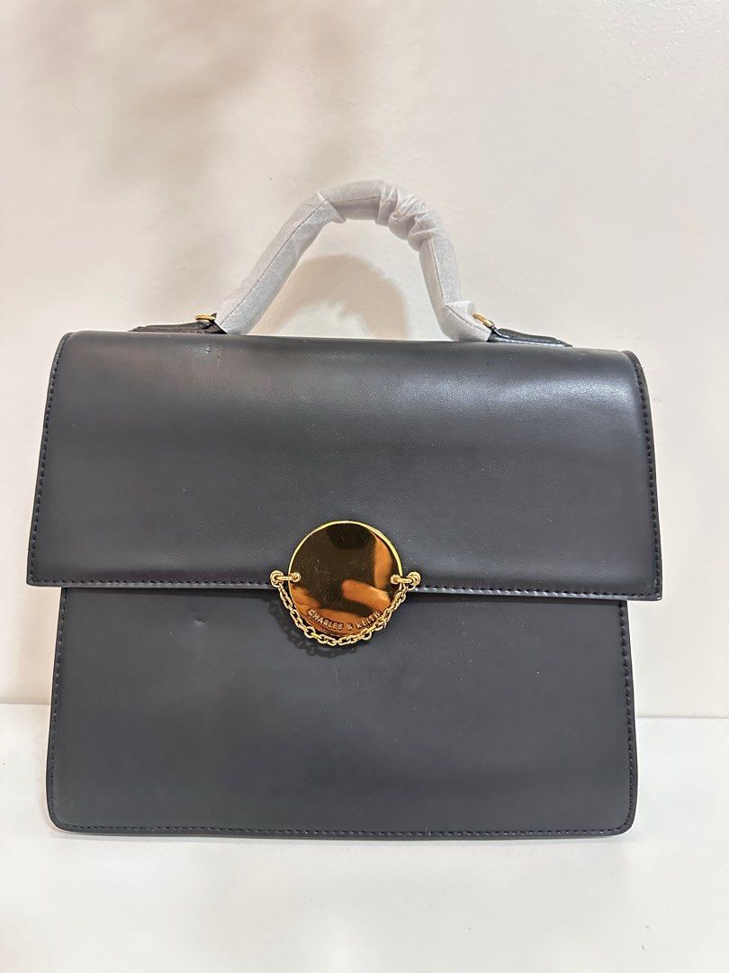Charles and Keith Crossbody Bag (Category: Cross-body Bags) located in Lipa City. Submitted by luciv (Listing ID 1377526905, Image 1). Description: .