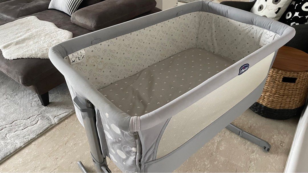 Chicco Next2Me Cot - Grey (Category: Cots & Cribs) located in Singapore. Submitted by whatusernametoput (Listing ID 1377433900, Image 3). Description: Chicco Next2Me bassinet in grey. Adjustable height and can be attached to the bed. Some stains are visible on the inner lining (see photos). You can literally just remove the fabric, wash the whole thing and the stains be gone . Otherwise in perfect functioning condition. NEGO FOR FAST DEALS .