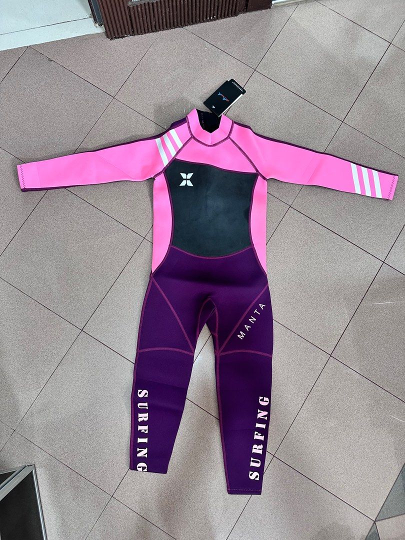 Dive & Sail Kids Wetsuit - Brand New (Category: Babies & Kids Fashion) located in Singapore. Submitted by rinde (Listing ID 1377403712, Image 2). Description: Brand new kids wetsuit. Features a full-body design with a back zipper for easy wear. The wetsuit is pink and purple with white stripes on the sleeves. Perfect for surfing and other water activities. XL 123-135cm .
