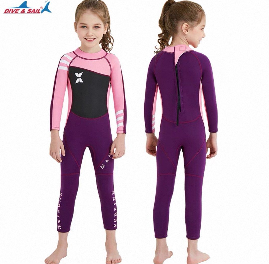 Dive & Sail Kids Wetsuit - Brand New (Category: Babies & Kids Fashion) located in Singapore. Submitted by rinde (Listing ID 1377403712, Image 1). Description: Brand new kids wetsuit. Features a full-body design with a back zipper for easy wear. The wetsuit is pink and purple with white stripes on the sleeves. Perfect for surfing and other water activities. XL 123-135cm .