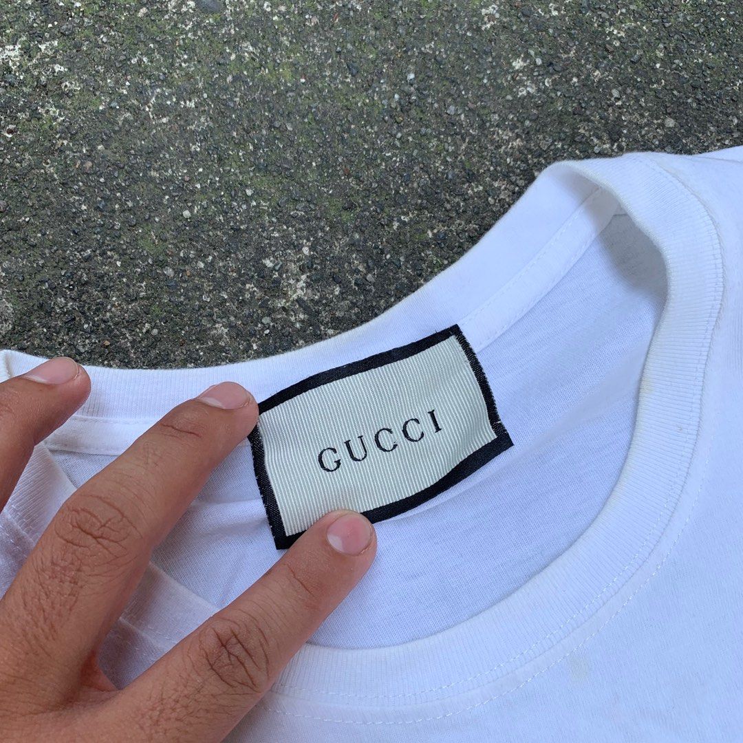 GUCCI LACE SHIRT (Category: Luxury Apparel) located in Manila. Submitted by rarefindslt (Listing ID 1377451211, Image 2). Description: GUCCI LACE SHIRT (SWIPE LEFT FOR MORE DETAILS..) M on tag in solid good condition rate! with tags for authenticity, with lace design, solid front print! can pass as new, no issue.