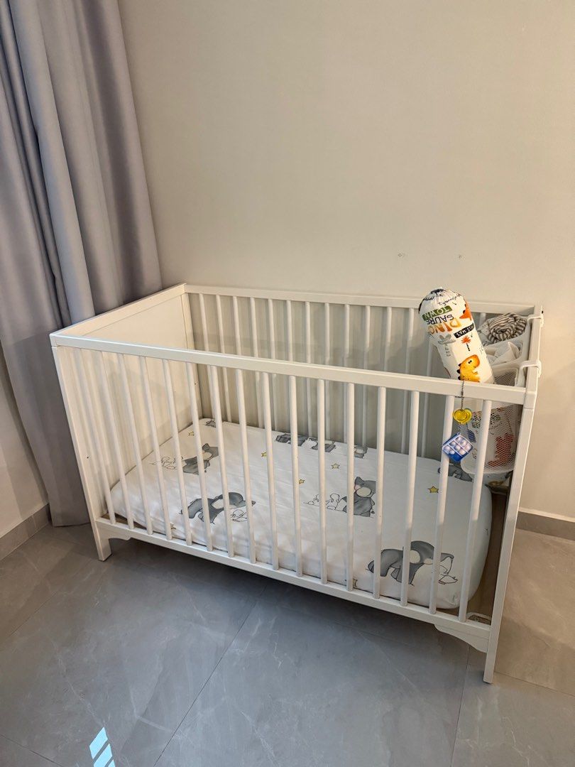 IKEA Baby Cot (Category: Cots & Cribs) located in Singapore. Submitted by miniduckie (Listing ID 1377526850, Image 1). Description: Cot only, doesn’t come with mattress or side basket. The cot is still in very good condition and is very sturdy. There’s only a few scratches that are barely visible. So anyone needs it can come self collect..