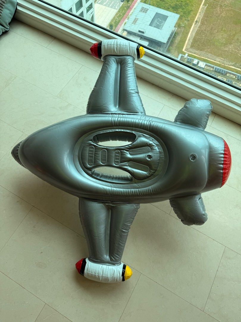 Inflatable Airplane Pool Float (Category: Infant Playtime) located in Singapore. Submitted by antares111 (Listing ID 1377407943, Image 3). Description: Fun inflatable airplane pool float for kids. Features a steering wheel and a comfortable seat. Perfect for pool or beach fun. Easy to inflate and deflate. Great for summer! Comes with horn Buy 2 and get a discount. .