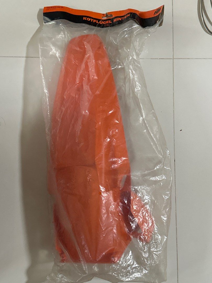 KTM Rear Fencer EXC (Category: Motorcycle Accessories) located in Singapore. Submitted by shatteredoptimus (Listing ID 1377454361, Image 1). Description: - Brand new KTM Rear Fender - Model: EXC - Color: Orange - In original packaging - Perfect replacement or spare - Unopened and unused.