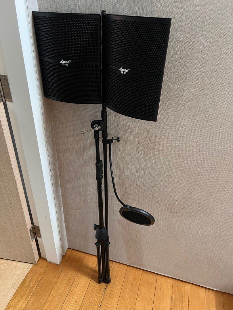 Lane IS-02 Microphone Isolation Shield with Pop Filter (Category: Microphones) located in Singapore. Submitted by dillo65780 (Listing ID 1377473060, Image 1). Description: This Lane IS-02 microphone isolation shield is in excellent condition. It includes a pop filter and adjustable stand. Perfect for home recording or podcasting. The shield effectively reduces unwanted noise and reflections, improving audio quality. Ready for immediate use..