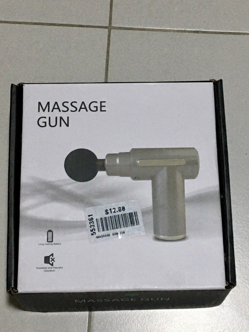 Massage Gun - USB Rechargeable with 4 Massage Heads (Category: Massage Devices) located in Singapore. Submitted by nss2023 (Listing ID 1377443343, Image 1). Description: This massage gun is USB rechargeable and comes with four massage heads for different muscle groups. It features adjustable intensity and noise reduction. The battery offers long-term use. It is brand new and ready to help you relax!.