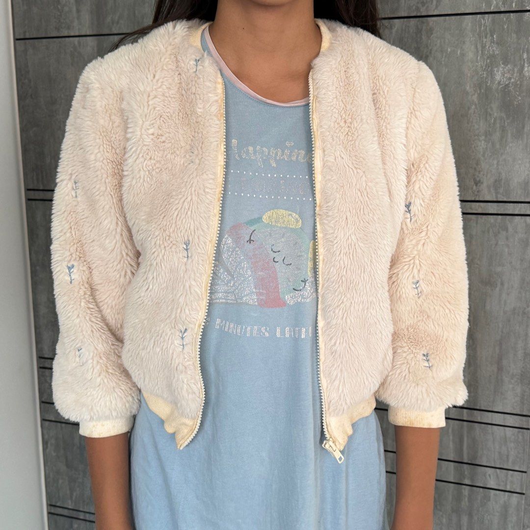 M&Co Fur Jacket (imitation) - 128cm (Category: Babies & Kids Fashion) located in Singapore. Submitted by jacektravel (Listing ID 1377400788, Image 1). Description: Check my other listings: more clothes. Imitation fur jacket in good condition. There are some stains on the inside only. The size is 128cm. (The “model” on the photo is 155cm tall.) Self collection only. A 2-minute walk from Redhill MRT. .
