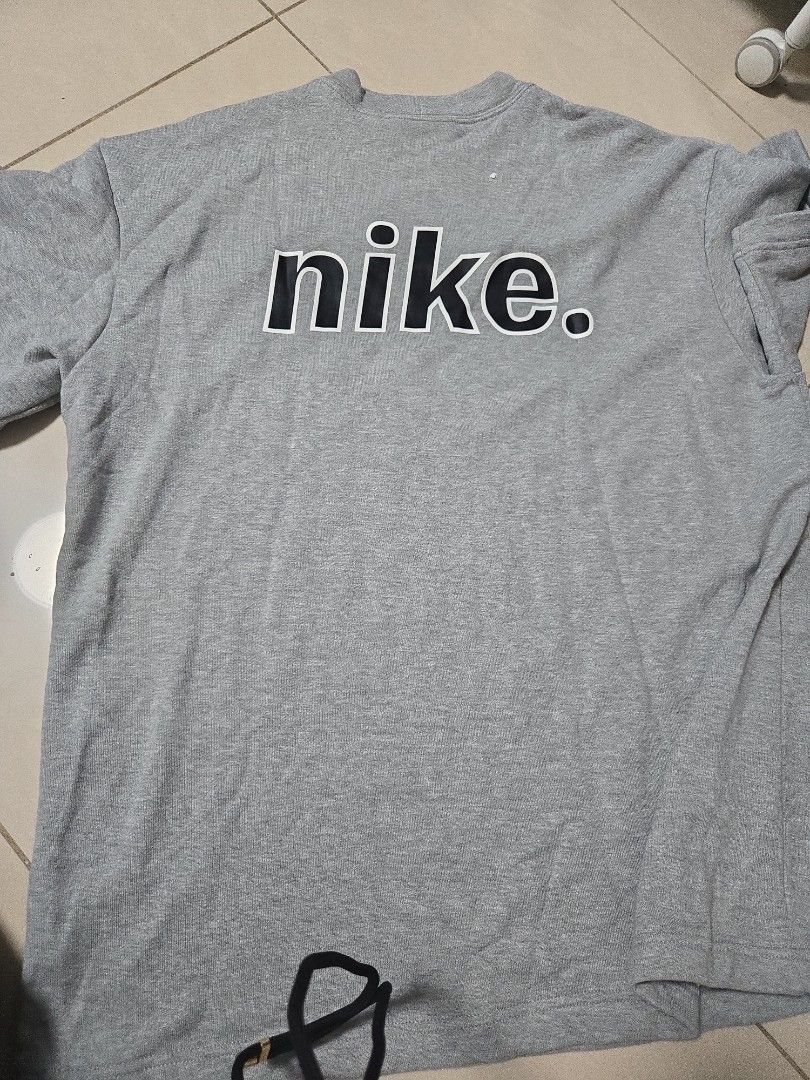 Nike Grey Crewneck oversie L/Red Air force Xl/Black Nike hoop XL (Category: Tshirts & Polo Shirts) located in Singapore. Submitted by capricorn_ascendant (Listing ID 1377439156, Image 2). Description: - Grey Nike crewneck t-shirt - Small Nike logo on front - Large 'nike.' print on back - Ideal for casual wear buy 1 for $10. 3 for $20.