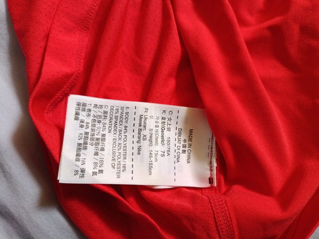 Nike Pro Red XS T-Shirt Top (Category: Activewear) located in Singapore. Submitted by orangejpn (Listing ID 1377390783, Image 3). Description: - Authentic Nike Pro quick dry top - Vibrant red color - Nike logo on front - Size: XS Height 55cm - Lightweight and breathable material - Made in China - Ideal for workouts or casual wear.