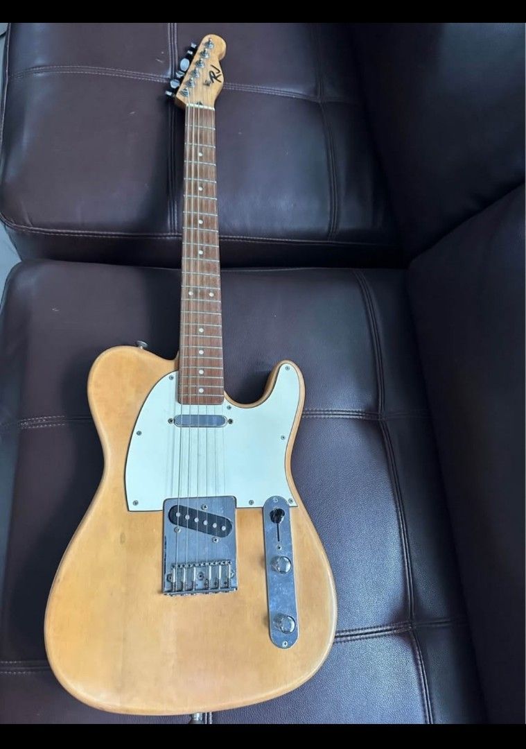 RJ telecaster early 2000 model (Category: Musical Instruments) located in Quezon City. Submitted by brandox (Listing ID 1377395826, Image 1). Description: RJ telecaster early 2000 model Good working condition. Hindi na nagagamit..