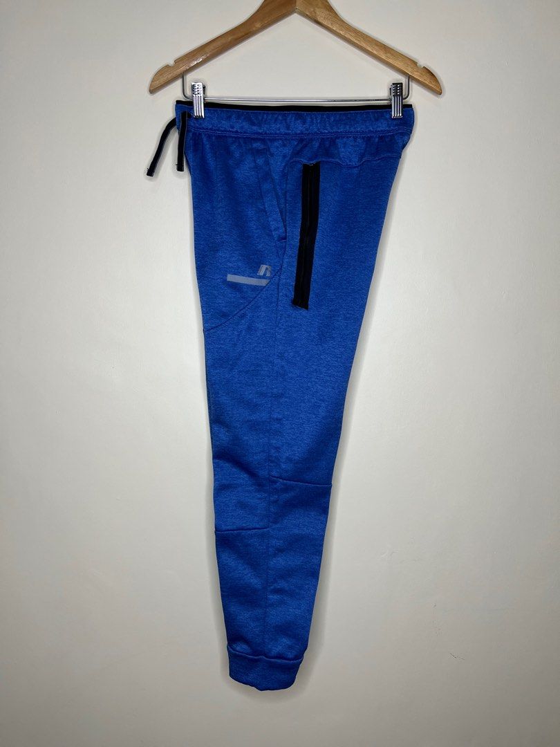 Russell athletic zip-pocket jogger pants (Category: Joggers) located in Lubao. Submitted by hydrogenph (Listing ID 1377498163, Image 2). Description: Waist: 28-33 Length: 36.