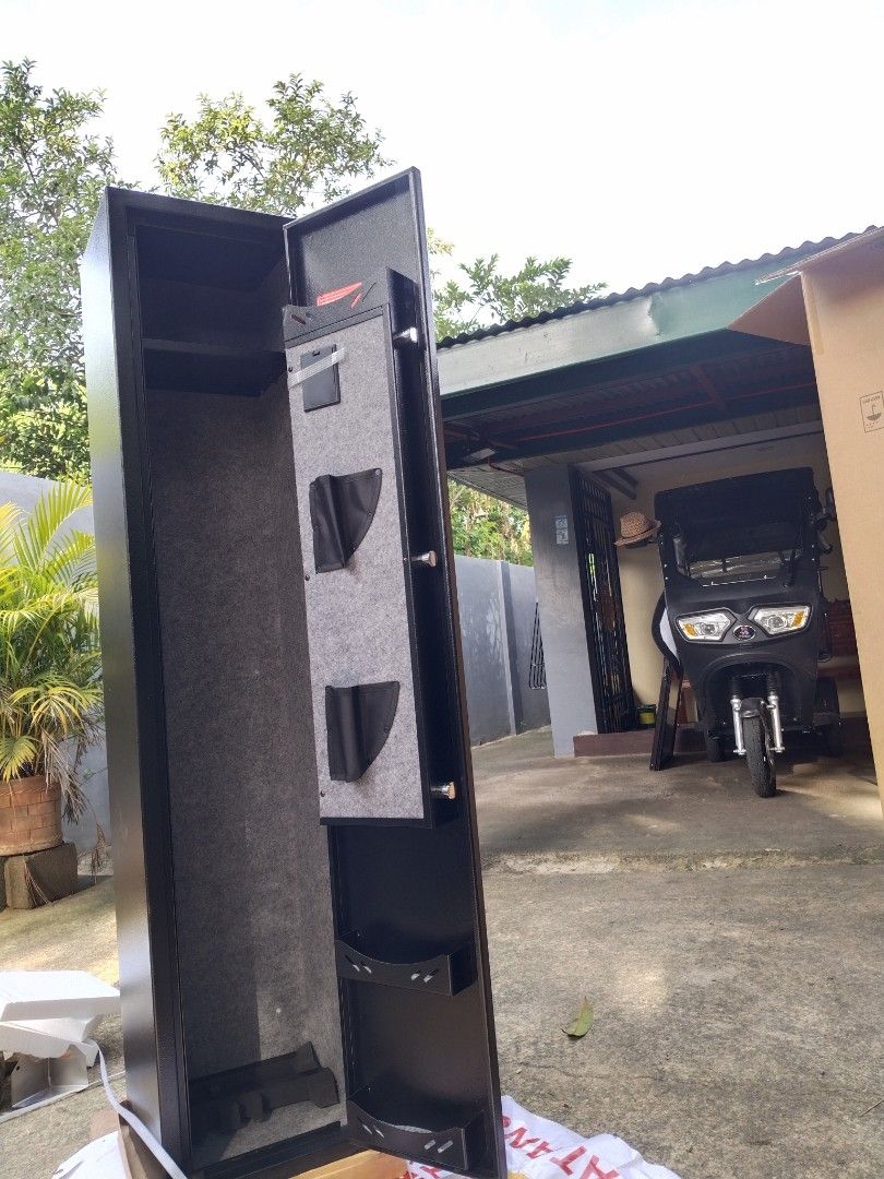 Safety Vault for Riffle / Gun Vault (Category: Safe) located in Caloocan City. Submitted by 5veezonlineshoppe (Listing ID 1377374603, Image 2). Description: Gun Vault Slim Type 30 x 28 x 138 cm L x W x H Hard metal alloy Wall mountable Brandnew With digital lock and fingerprint Comes with: Manual Keys Expansion battery Message for details We deliver #gunvault #gunsafe #gunsforriffle.