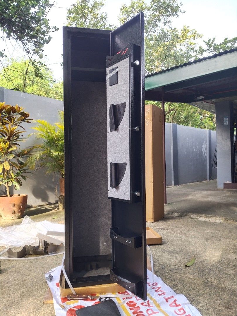 Safety Vault for Riffle / Gun Vault (Category: Safe) located in Caloocan City. Submitted by 5veezonlineshoppe (Listing ID 1377374603, Image 3). Description: Gun Vault Slim Type 30 x 28 x 138 cm L x W x H Hard metal alloy Wall mountable Brandnew With digital lock and fingerprint Comes with: Manual Keys Expansion battery Message for details We deliver #gunvault #gunsafe #gunsforriffle.