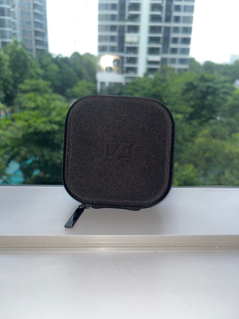 Sennheiser black Earphones with Case (Category: Earphones) located in Singapore. Submitted by poopoomcgee (Listing ID 1377438971, Image 1). Description: Sennheiser earphones in excellent condition, complete with original case. Includes various ear tips and a headphone adapter. The earphones appear to be lightly used and well-maintained. Perfect for music lovers seeking quality sound. Comes with free travel adapter .