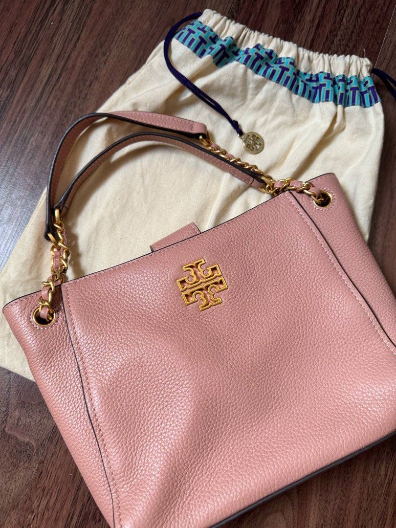 Tory Burch Moonpink Britten Mini Tote Bag (Category: Luxury Bags & Wallets) located in Binangonan. Submitted by jenggayloo (Listing ID 1377476723, Image 3). Description: > Good as New. Used Twice > Leather Material > Has one zip pocket and slip pocket > L 11.4”, W 5.4”, H8.6” .
