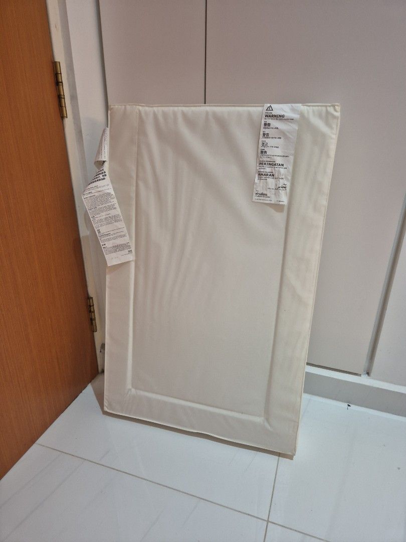 White Changing Pad - Vadra (Ikea) (Category: Changing Mats & Accessories) located in Singapore. Submitted by jonjonjonjonjonjon (Listing ID 1377542832, Image 2). Description: - White changing pad - Excellent condition - No stains or wear - Rectangular shape - Raised safety border - Clean and ready for use Self collect at Canberra Walk. .