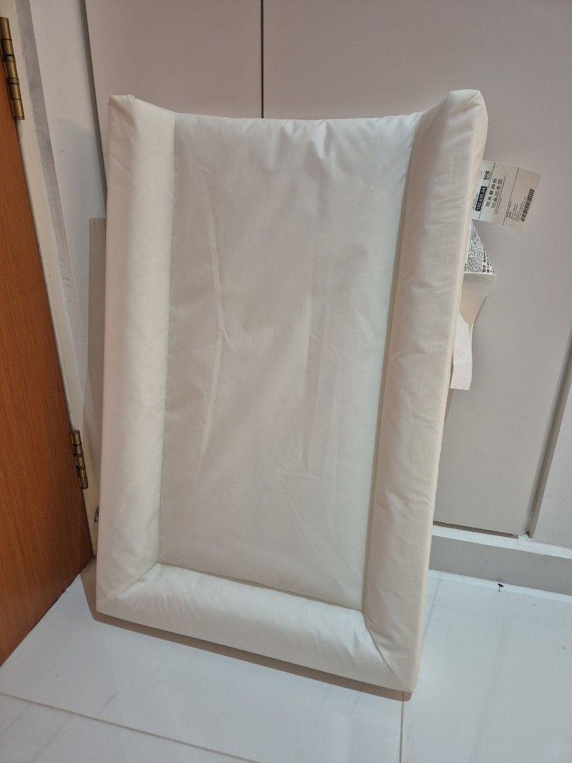 White Changing Pad - Vadra (Ikea) (Category: Changing Mats & Accessories) located in Singapore. Submitted by jonjonjonjonjonjon (Listing ID 1377542832, Image 1). Description: - White changing pad - Excellent condition - No stains or wear - Rectangular shape - Raised safety border - Clean and ready for use Self collect at Canberra Walk. .