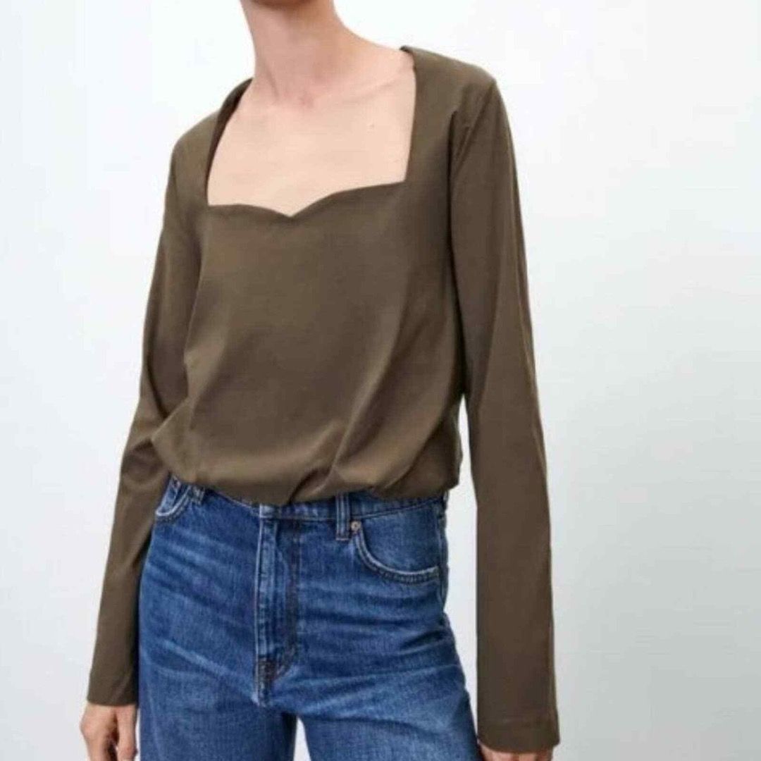 ZARA Olive Green Sweetheart Square Neckline Long Sleeve Top (Category: Blouses) located in Singapore. Submitted by fickle.fun (Listing ID 1377495414, Image 3). Description: BRAND NEW NEVER WORN OUT sweetheart neckline, high quality material, gathered bottom, long sleeves neckline area is slightly too big for me (XS), might be better for a bigger chest or M size colour is between olive brown and autumn brown.