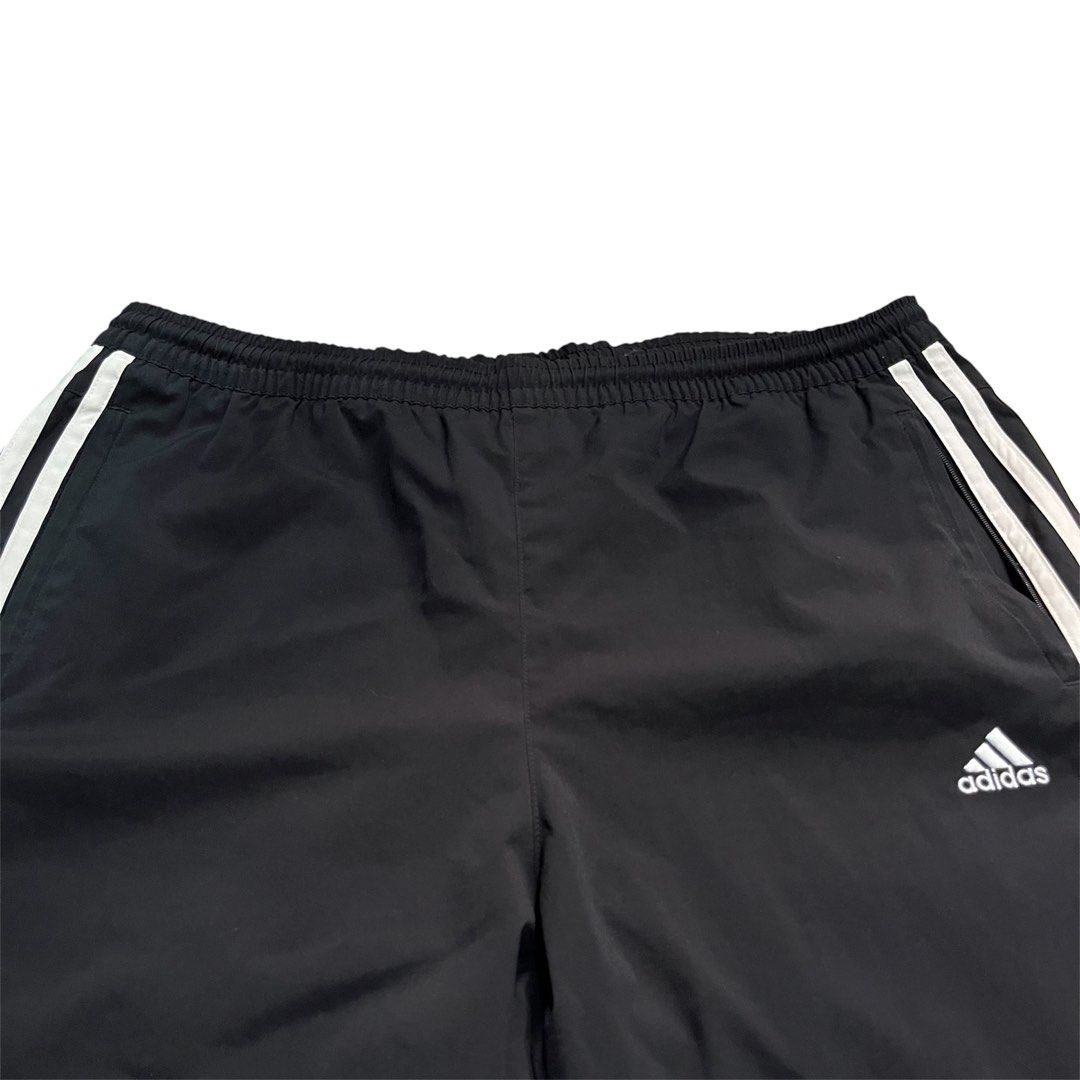 Adidas 3-stripe black casual plain drawstring parachute pants (Category: Other Bottoms) located in Calamba. Submitted by natikalachuchi (Listing ID 1377663967, Image 2). Description: Fits: M-XL Waist: 34” Length:40” .