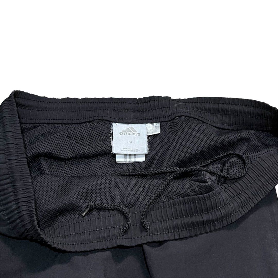Adidas 3-stripe black casual plain drawstring parachute pants (Category: Other Bottoms) located in Calamba. Submitted by natikalachuchi (Listing ID 1377663967, Image 3). Description: Fits: M-XL Waist: 34” Length:40” .