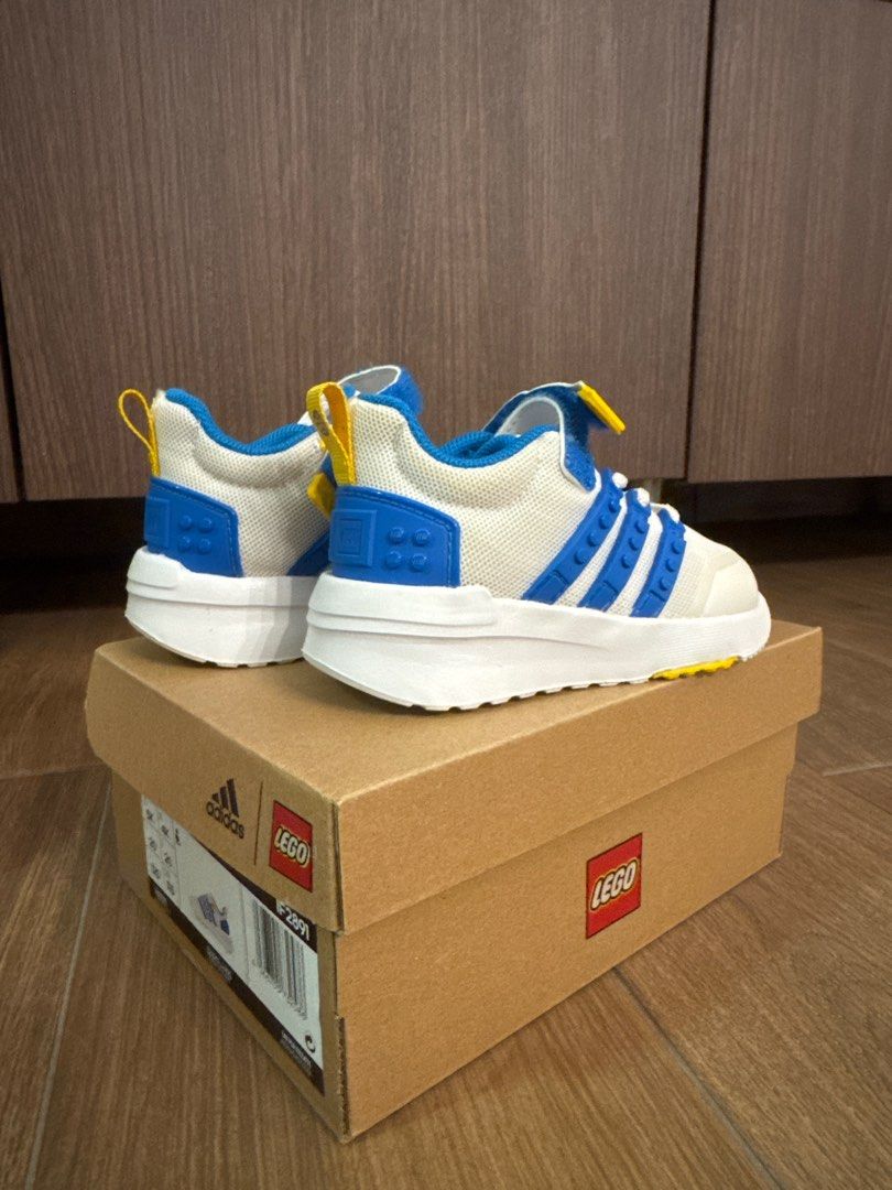 Adidas x LEGO Kids Shoes (Category: Babies & Kids Fashion) located in Singapore. Submitted by eestrella (Listing ID 1377721320, Image 1). Description: Brand new Adidas x LEGO kids shoes. Comes with original box. Features a white base with blue and yellow accents. Perfect for little ones who love both Adidas and LEGO! Size US 5K.