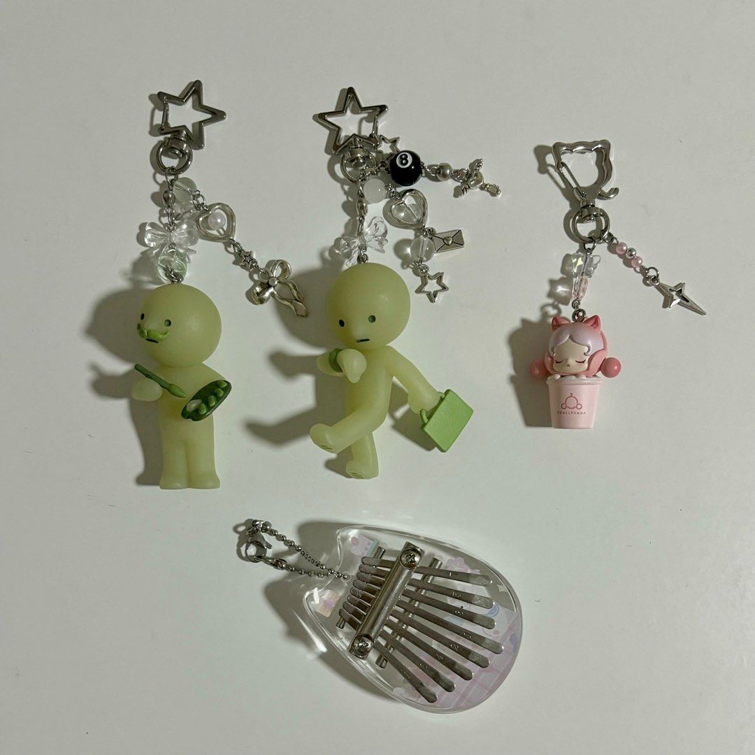 assorted keychains (Category: Other Merchandise) located in Singapore. Submitted by castlemins (Listing ID 1377705237, Image 1). Description: please check ALL pics/read below for details! screenshot and circle if interested :) available: 💚 museum series smiski velazquez keychain, work series smiski on the road keychain $11 each 🩷 skullpanda taiwan exclusive strawberry pink popbean $9 💜 kalimba keychain $10 - payment by cash, paynow, or paylah 