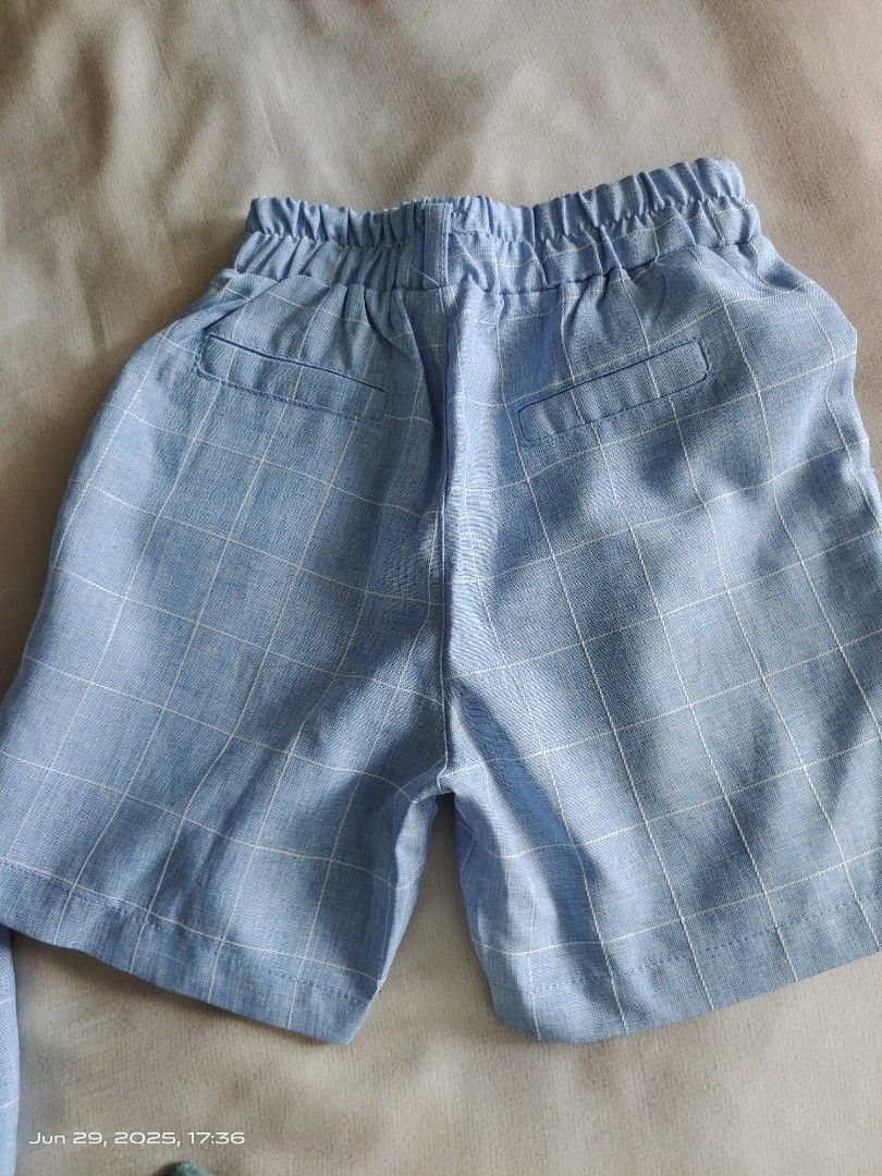 Baby Boy Formal Outfit Set (Category: Babies & Kids Fashion) located in Singapore. Submitted by Boss_Baby (Listing ID 1377657430, Image 3). Description: - Baby boy formal outfit set - Includes: vest, shorts, shirt, and bow tie - Vest and shorts: Light blue plaid - Shirt: White - Excellent condition - Perfect for special occasions and photoshoots.