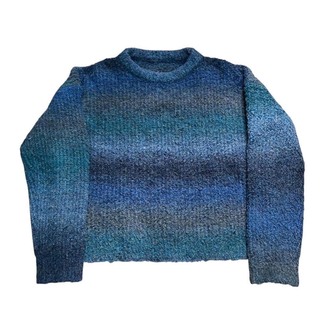 Blue oversized longsleeves fluffy knit sweater (Category: Longsleeves) located in Calamba. Submitted by natikalachuchi (Listing ID 1377667320, Image 1). Description: Fits: S-XL Waist: 50” Length: 22.5”.