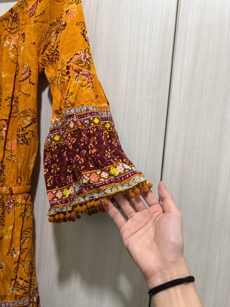 Bohemian Romper Bell Sleeved with Pompoms (Category: Rompers) located in San Juan City. Submitted by j_mcl (Listing ID 1377615655, Image 2). Description: Few missing pompoms on sleeve but barely noticeable. Still nice. Super boho look!.