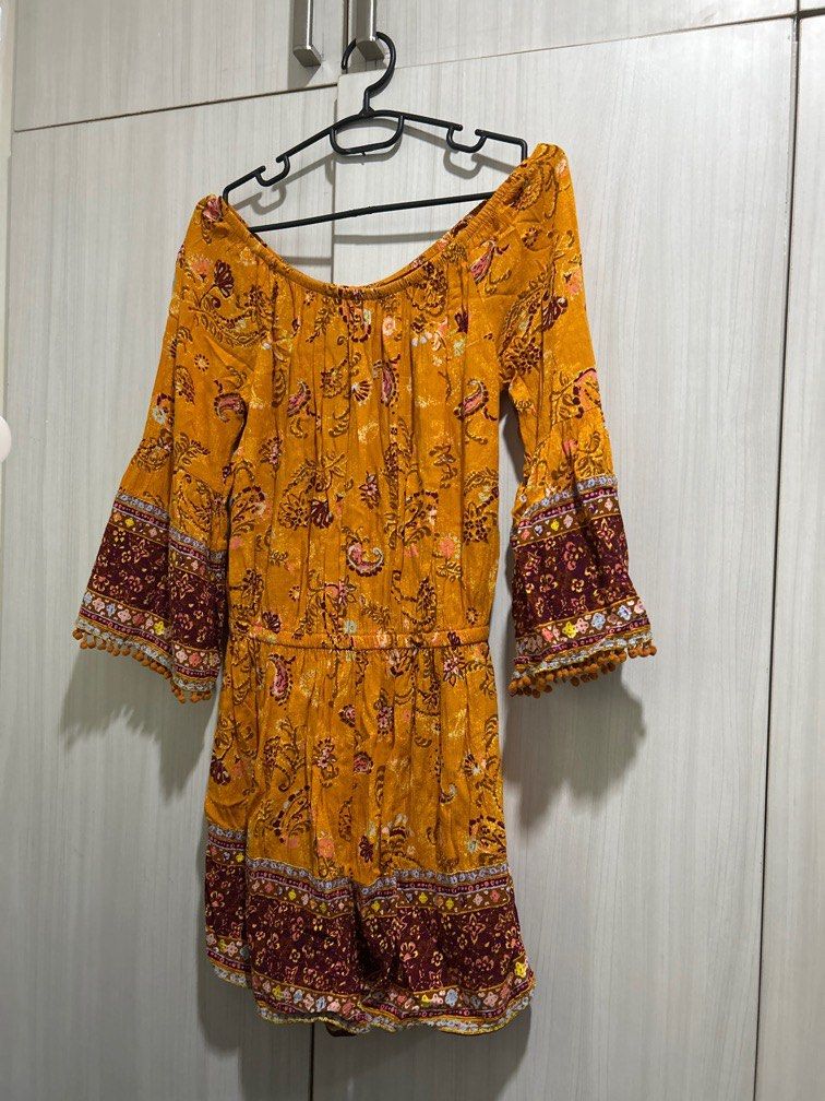 Bohemian Romper Bell Sleeved with Pompoms (Category: Rompers) located in San Juan City. Submitted by j_mcl (Listing ID 1377615655, Image 1). Description: Few missing pompoms on sleeve but barely noticeable. Still nice. Super boho look!.
